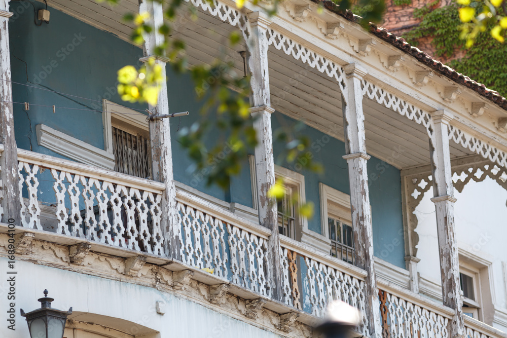Traditional georgian architecture: wooden balconies and stone carvings