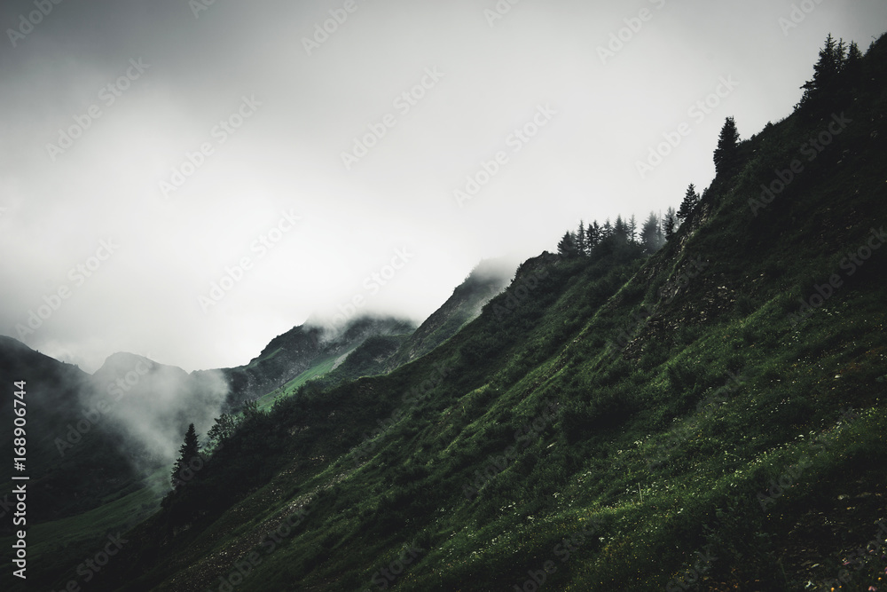 Gloomy cloudy rugged mountain landscape