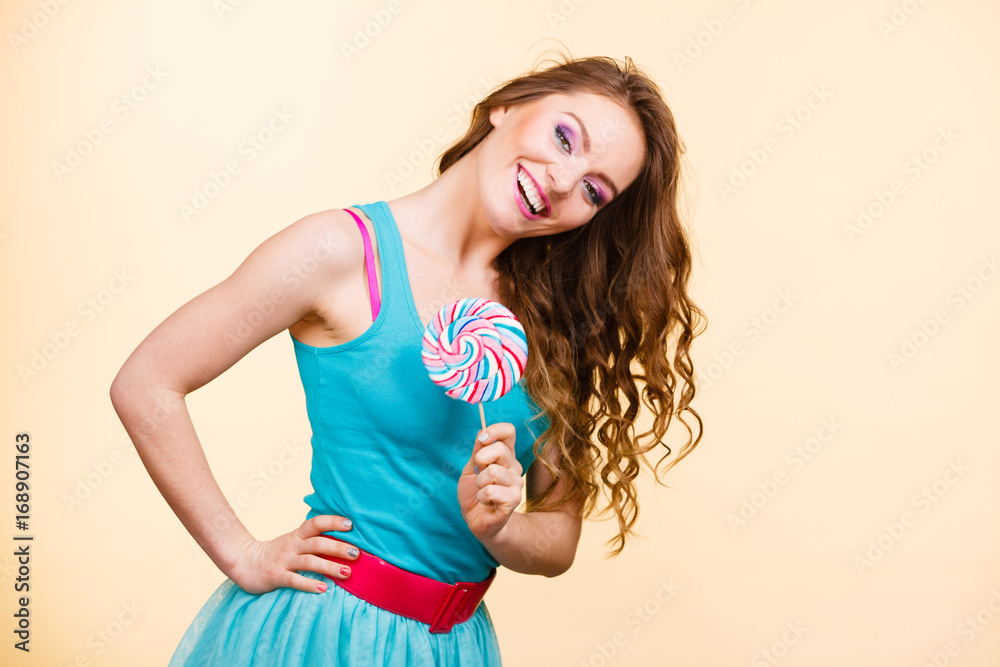 Woman joyful girl with lollipop candy Woman joyful girl with lollipop candy