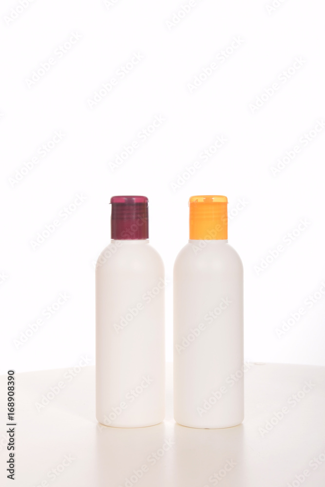 Cosmetics in bottles of plastic containers and tubes Cosmetics in bottles of plastic containers and tubes