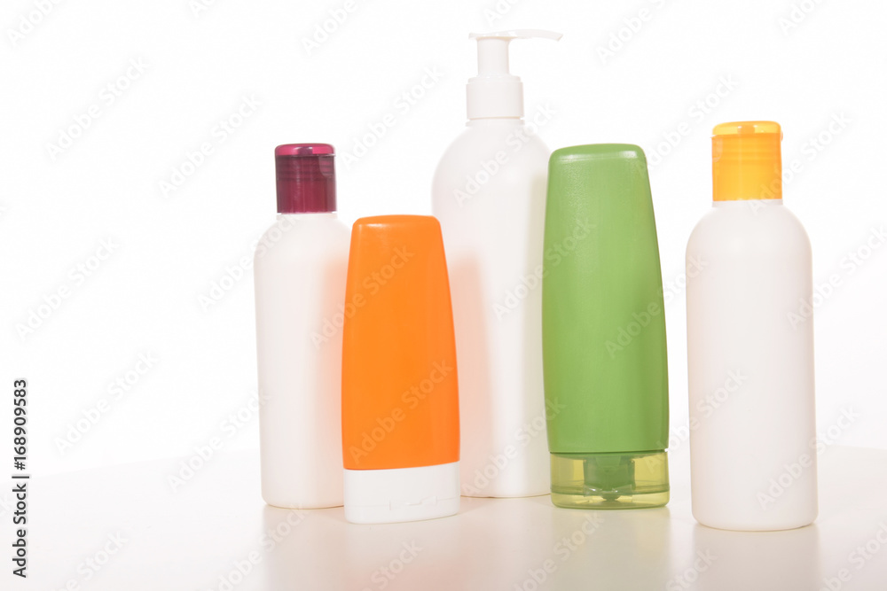 Cosmetics in bottles of plastic containers and tubes Cosmetics in bottles of plastic containers and tubes