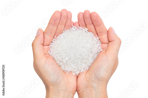 holding sea salt isolated on white background