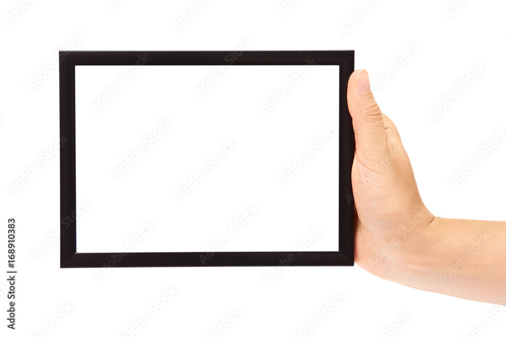 Decorative black photo frame in hand isolated on white background Decorative black photo frame in hand isolated on white background