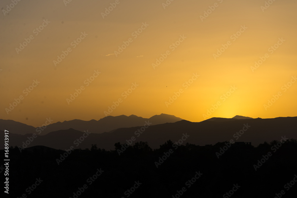 sunset in atlas mountains, morocco