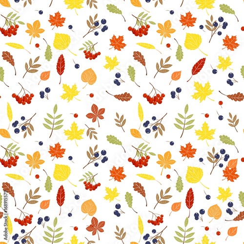 Seamless autumn background with leaves in orange, beige, brown and yellow. Ideal for Wallpaper, fabric, gift paper, pattern fills, background of web pages, autumn greeting cards. © mariaassorova