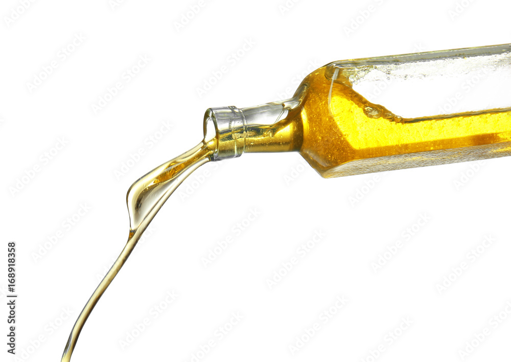 Pouring cooking oil from bottle on white background Stock Photo Adobe