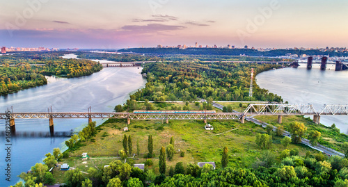 Kiev Urban Electric Train on the Petrovsky Railway Bridge in Ukraine © Leonid Andronov