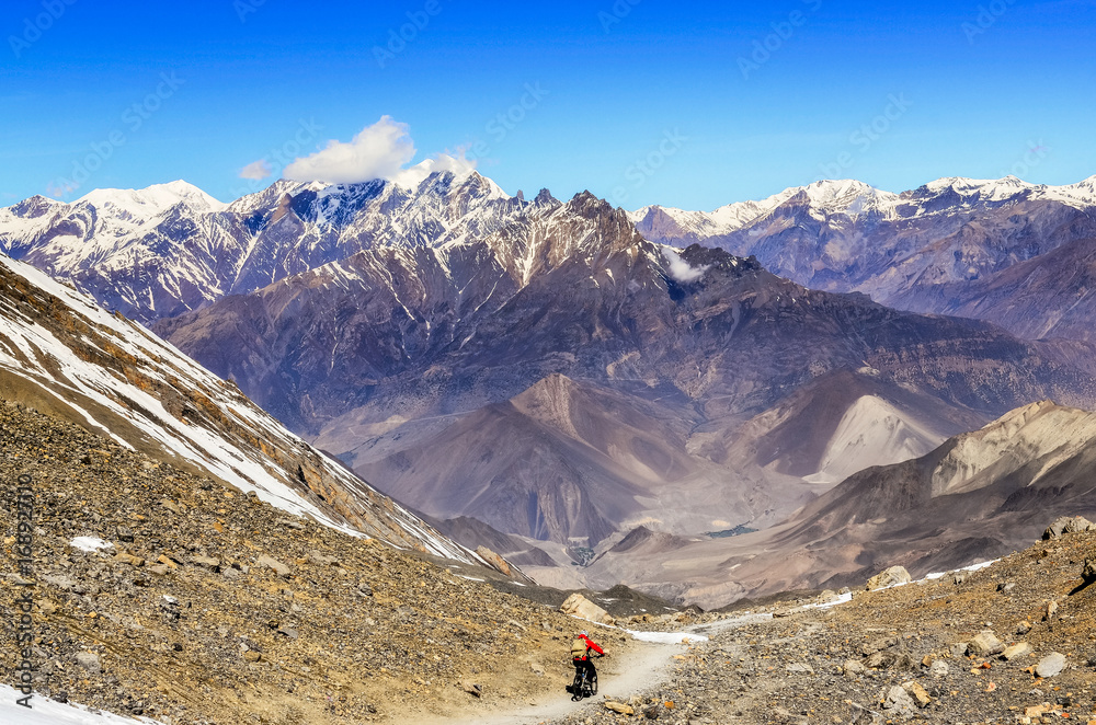 Mountain biker in Himalayas mountains