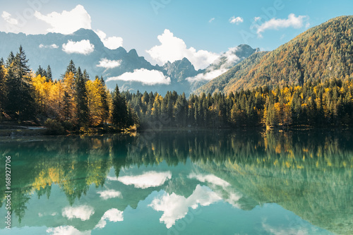 Autumn view of a forest reflecting in a lake