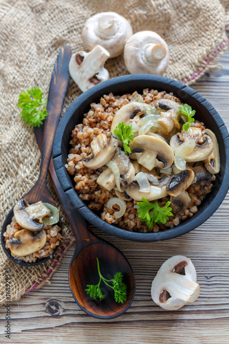 Traditional Russian food: buckwheat with mushrooms and onions.