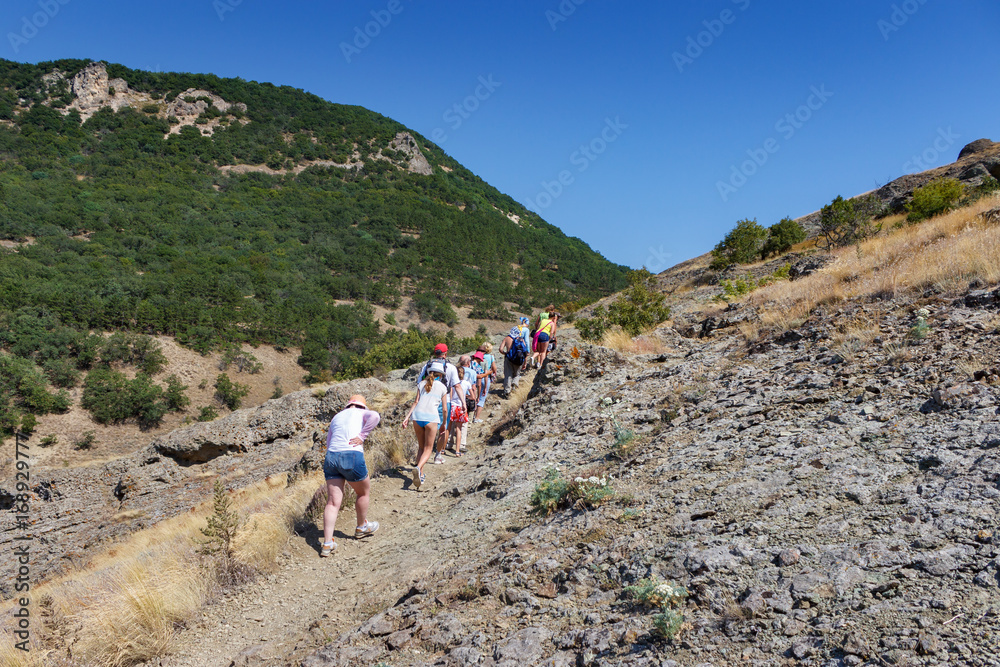 A group of people traveling through the mountains in the Crimea
