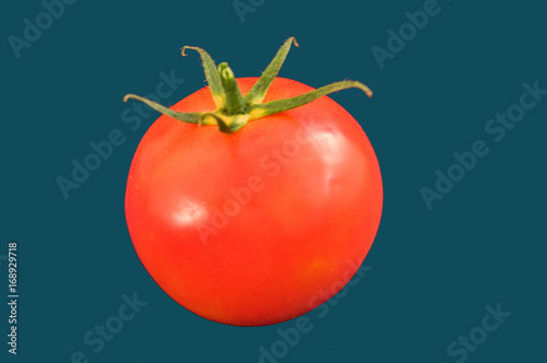 Świeży pomidor w tle