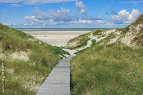 Wooden footpath to the beach on the German North Frisian island of Amrum