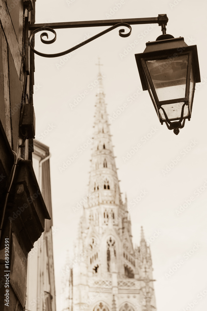 Street lamp and Roen cathedral in historic part of Rouen, France