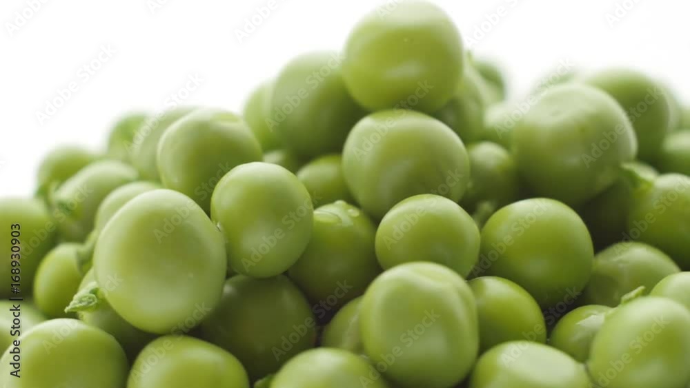 Fresh green peas rotate. Counterclockwise rotation . Close up Fresh green peas rotate. Counterclockwise rotation . Close up