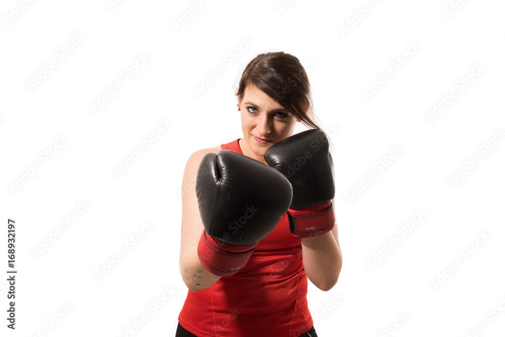 Smiling while showing her fist - isolated Smiling while showing her fist - isolated