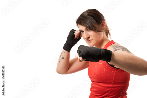 attractive girl standing in fight position - isolated