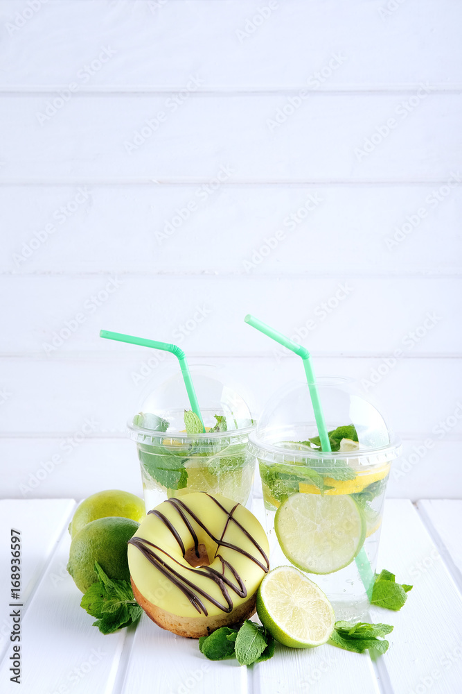 Fototapeta premium Refreshing summer drink. Lime and mint mohito.