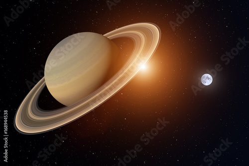 Fototapeta Naklejka Na Ścianę i Meble -  Nahe am Saturn. Der Saturn mit seinem Ring im Vordergrund. Die Sonne beleuchtet ihn im Hintergrund. Weit entfernt die Erde. Erstellt in 3D