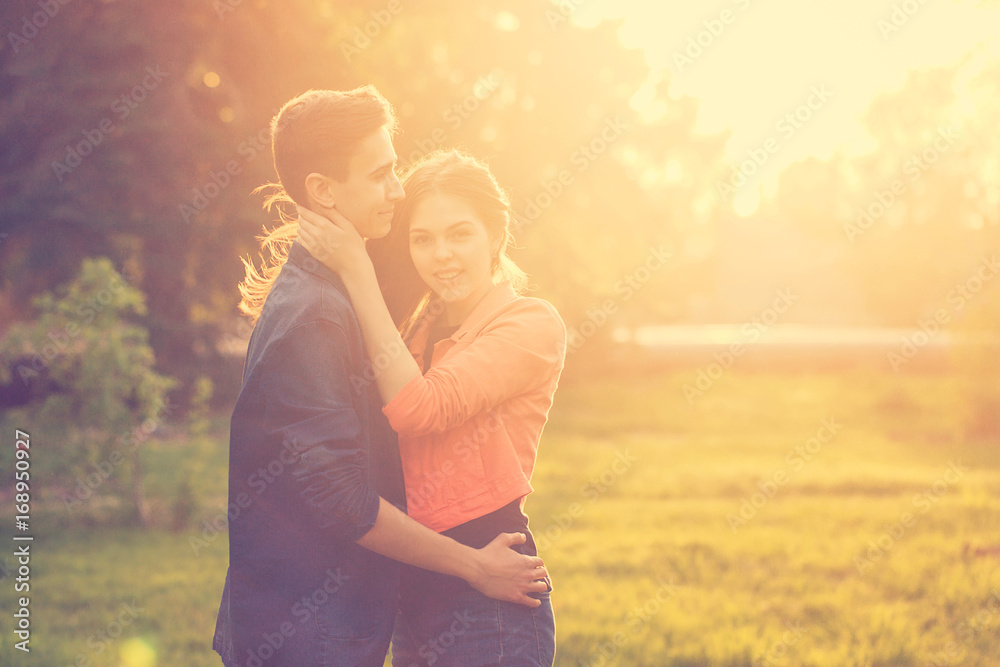 Dating couples in park at sunset Dating couples in park at sunset