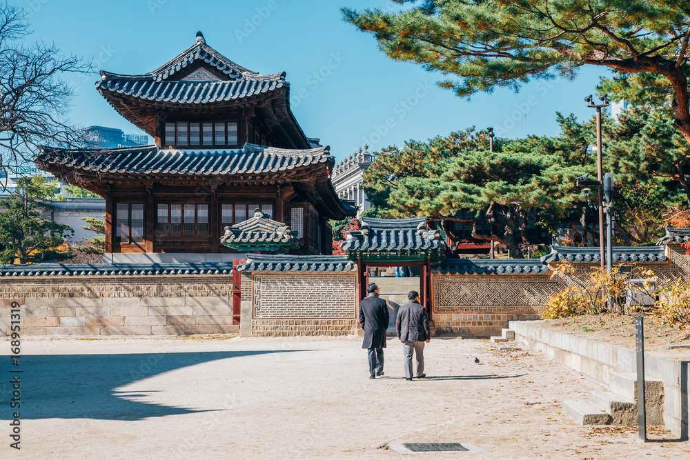 Autumn maple and Korean traditional architecture at Deoksugung Palace in Seoul, Korea Autumn maple and Korean traditional architecture at Deoksugung Palace in Seoul, Korea