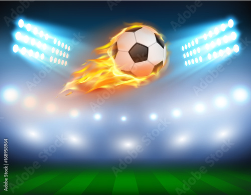 Vector illustration of a football, soccer ball in a fiery flame on a field with the searchlights turned on in a realistic style. Print, template, design element. © vectorpocket