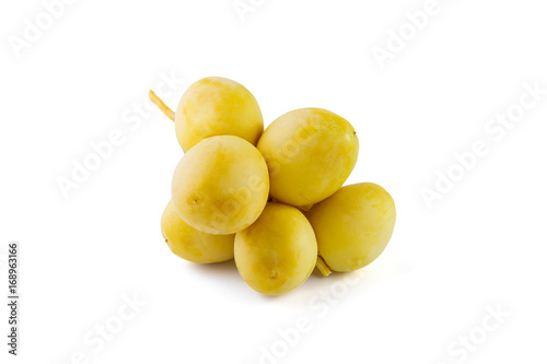 Yellow date palms isolated on white background photo