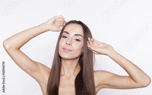 Wallpaper Mural Beauty Woman face Portrait. Beautiful model Girl with Perfect Fresh Clean Skin brunette hair and Skin Care Concept. Isolated on a white background. Torontodigital.ca