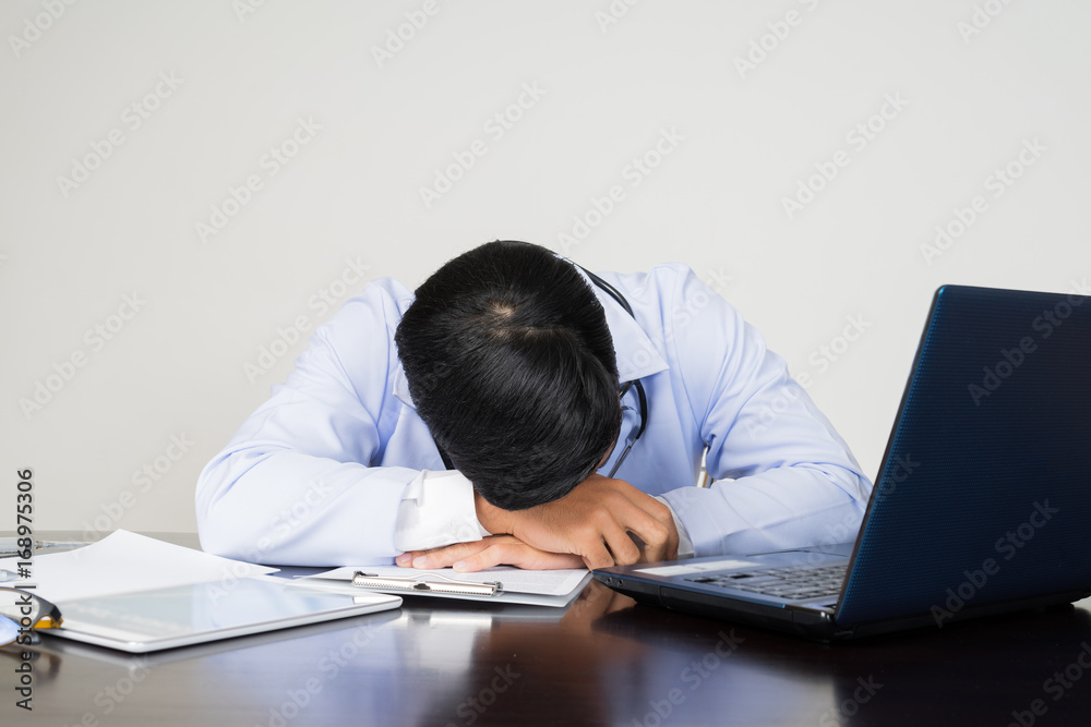 medical doctor working with laptop computer on white background medical doctor working with laptop computer on white background