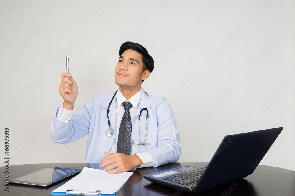 medical doctor working with laptop computer on white background medical doctor working with laptop computer on white background