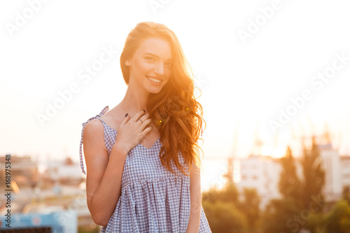 Attractive Smiling Ginger girl in dress