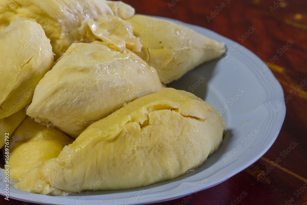 Durian thai fruit on plate on old wood