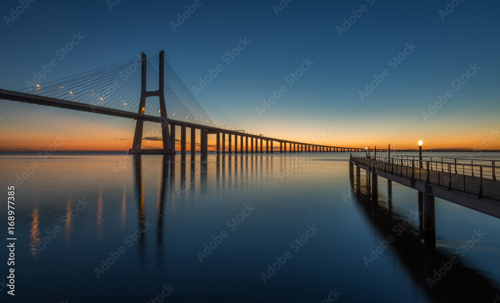 Sunrise in Lisbon, under the Vasco da Gama Bridge, portugal