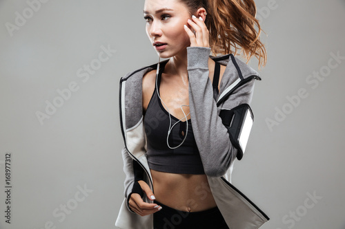Cropped image of a pretty young fitness woman in sportswear