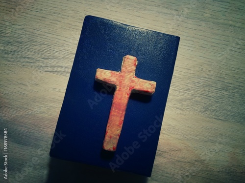 Cover of Bible with Christ Cross photo