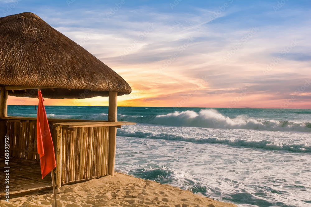 Fototapeta premium Beach Hut and Stormy Sea
