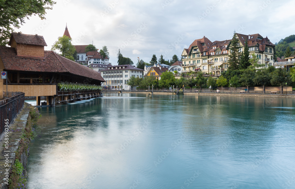 Fototapeta premium River Aare and wooden bridge