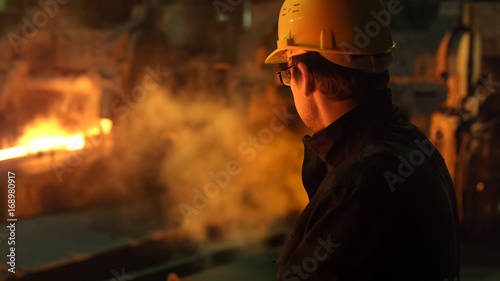 Obraz na plátne Portrait of Heavy Industry Technician in Hard Hat in Foundry