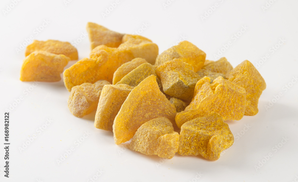 preserved fruits or dry ginger on the background. preserved fruits or dry ginger on the background.