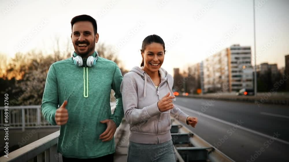 Happy friends and sports people jogging and running outdoor