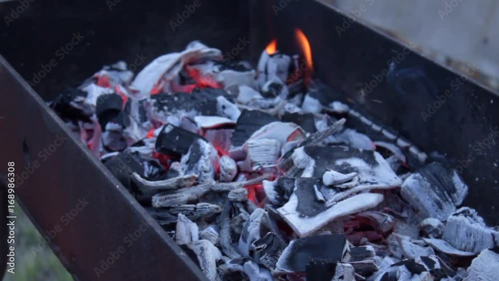 The smoldering coals for a barbecue The smoldering coals for a barbecue