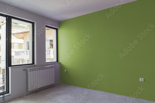 Unfinished interior of apartment  under construction. Wall paint