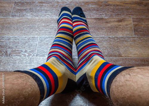 Men's legs in striped socks