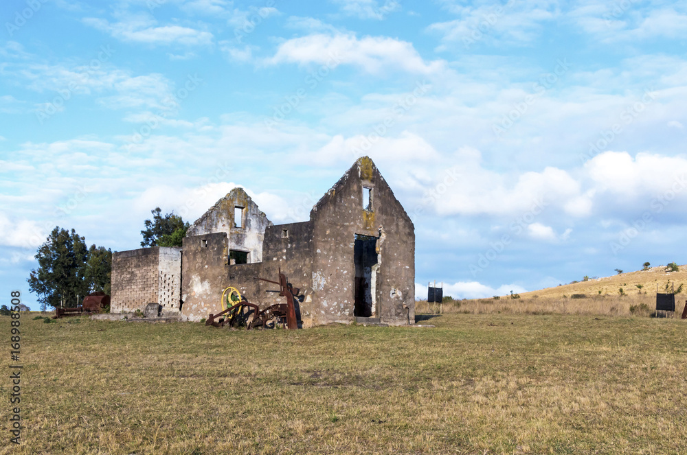 Rural Old Derelect Farm Building on Dry Winter Landscape Rural Old Derelect Farm Building on Dry Winter Landscape