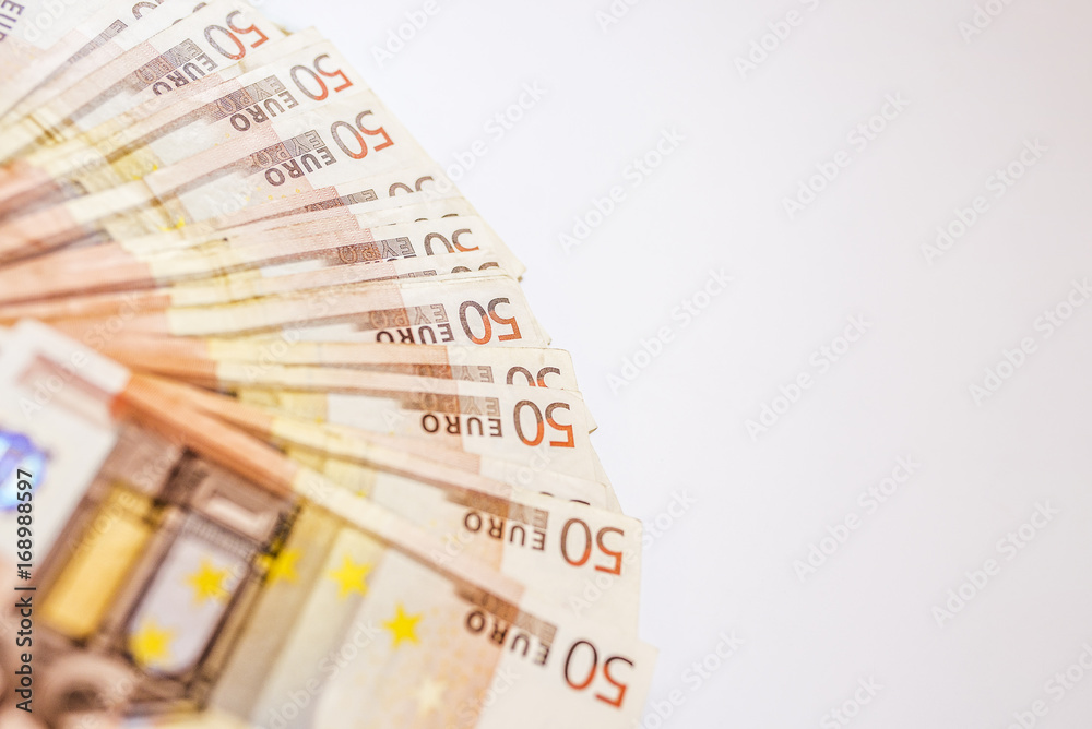 50 euro banknotes in a row. European Union Currency. Stack of 50 euro banknotes. 50 euro banknotes in a row. European Union Currency. Stack of 50 euro banknotes.