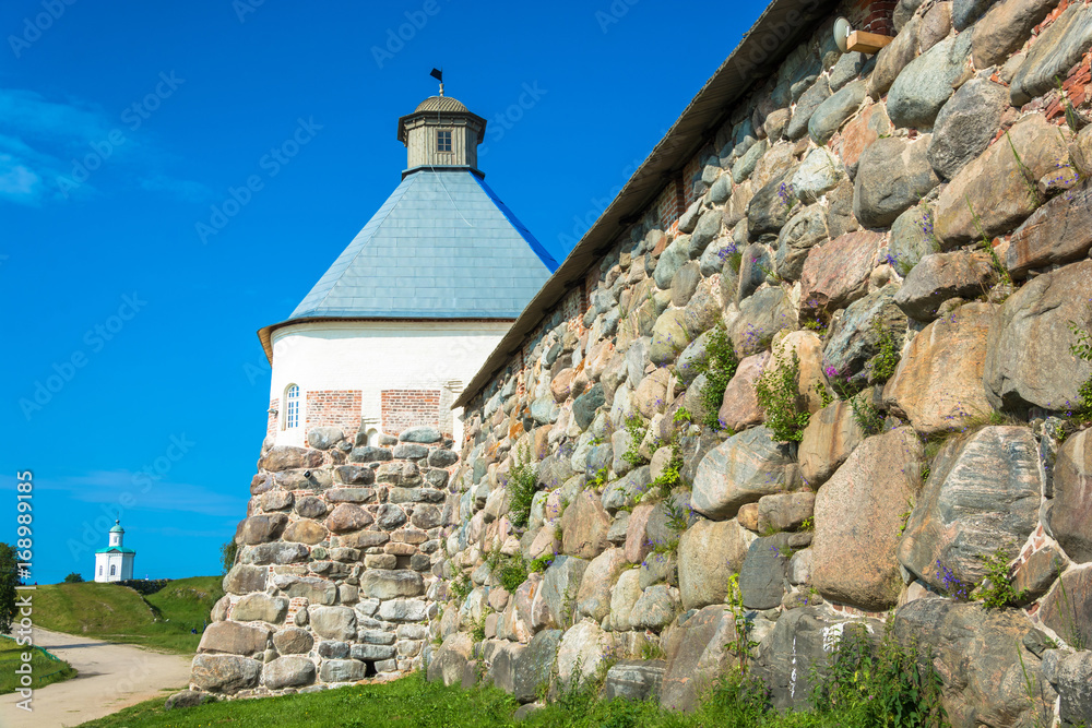 The high stone wall of the Spaso-Preobrazhensky Solovetsky monastery. The high stone wall of the Spaso-Preobrazhensky Solovetsky monastery.