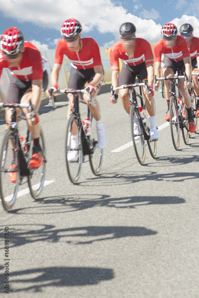Fototapeta premium Group of cyclist during a race, motion blur