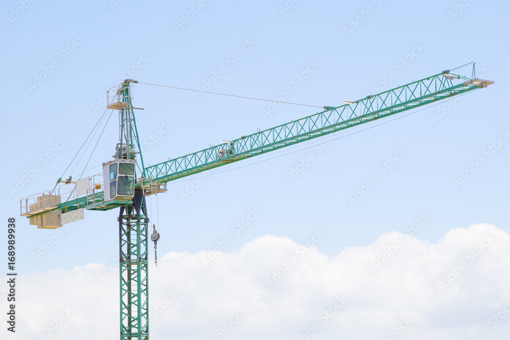 Green tower crane
