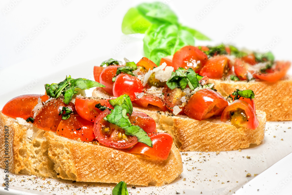 Fresh tomato basil bruschetta on toast Fresh tomato basil bruschetta on toast