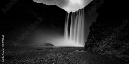 Black and white picture of Skogafoss, one of the most stunning waterfalls in Iceland
